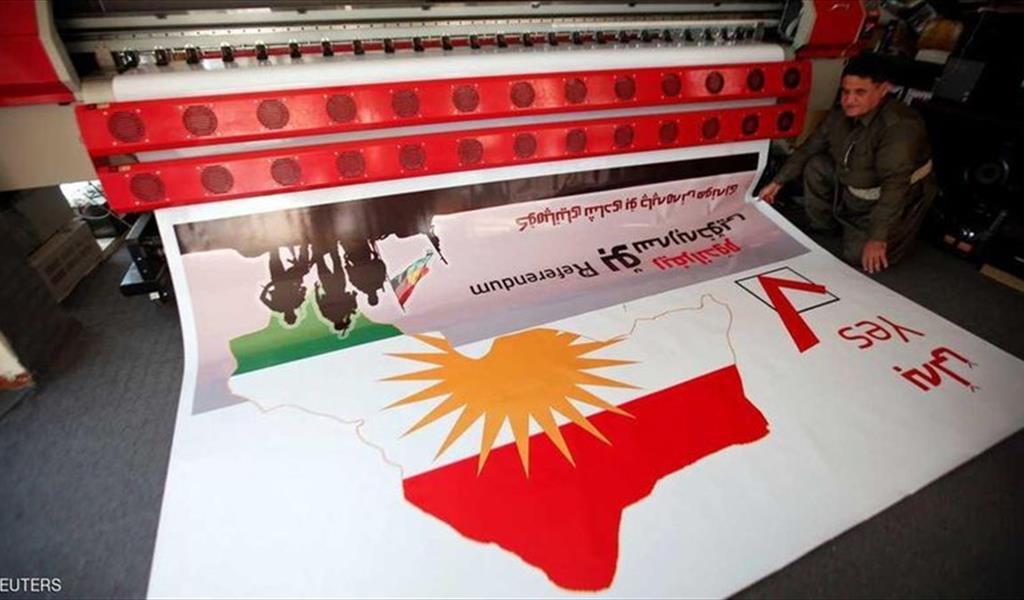 لافتة مطبوعة حول استفتاء كردستان