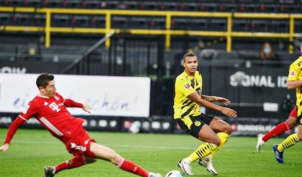 بايرن ميونيخ يحسم قمة دورتموند بالدوري الالماني وينفرد بالصدارة