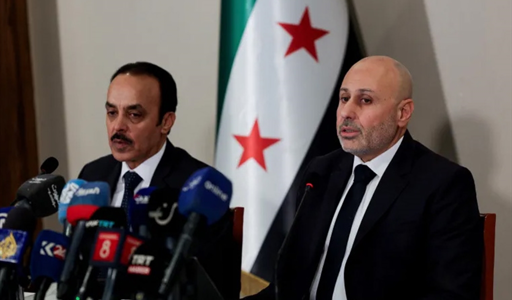 ياسر الفرحان خلال المؤتمر الصحفي في دمشق