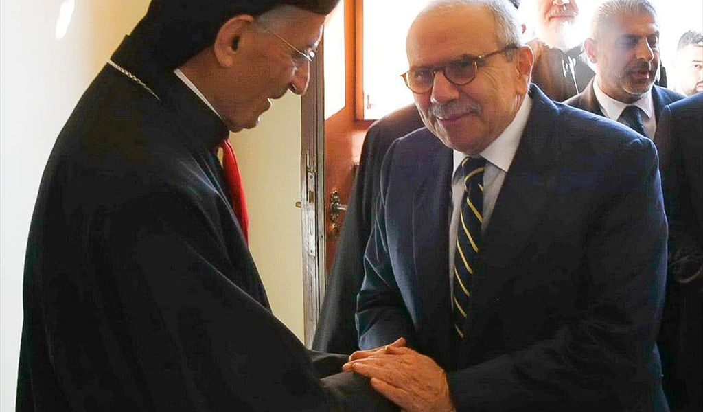 الرئيس سلام مصافحاً البطريرك الراعي