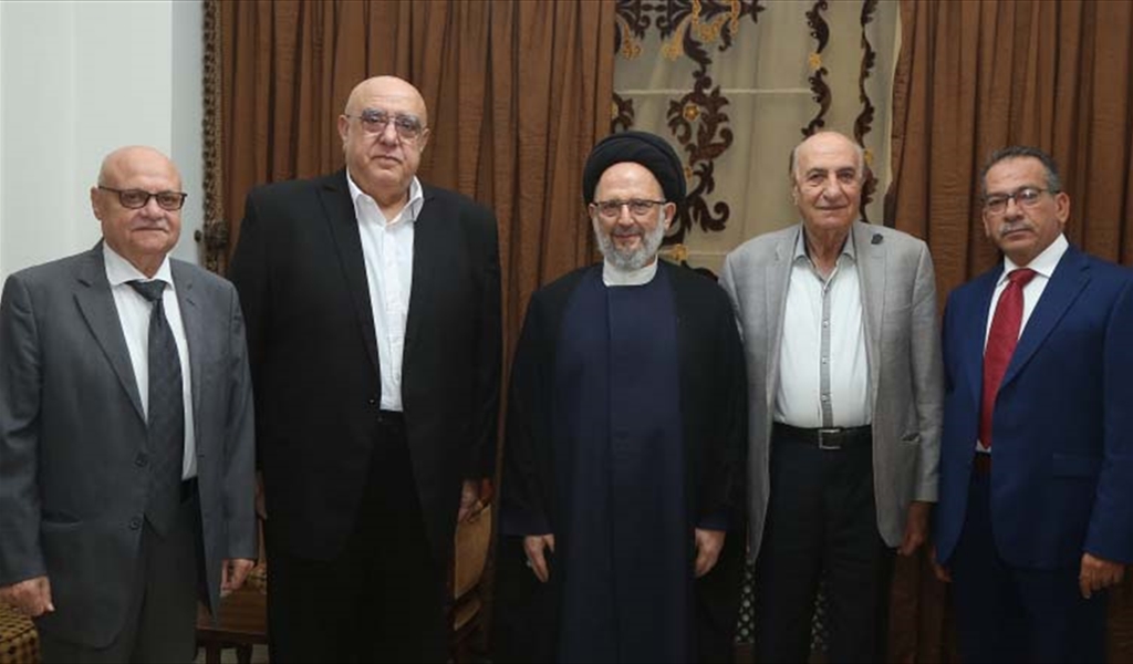 السيد فضل الله متوسطاً العميد حمدان ووفد المرابطون