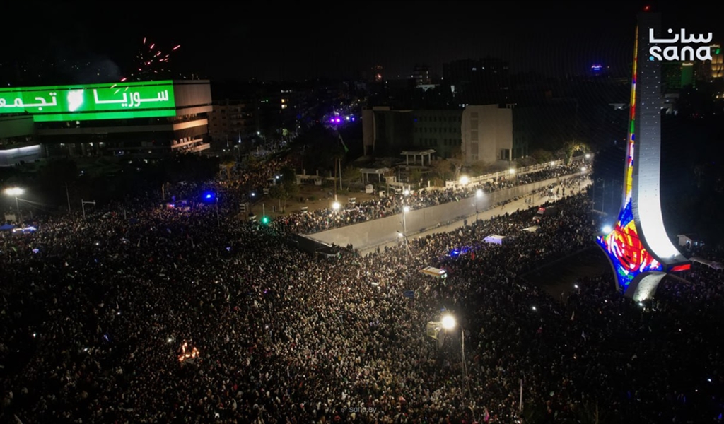 احتفالات في دمشق وأتراح في طهران
