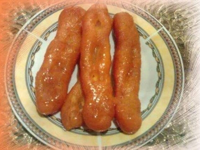 ليلة الدايم دايم.. عادات وتقاليد أصابع يوحنا في عيد الغطاس (صور)