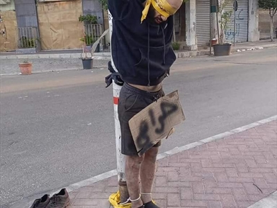 لصّ معلّق على أحد الأعمدة في الغبيري (محمود يوسف)