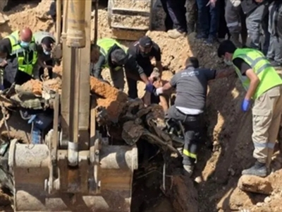 خلال عملية انتشال السيارة والجثامين