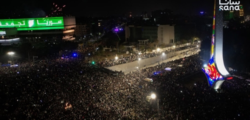 احتفالات في دمشق وأتراح في طهران