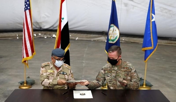 تسليم قاعدة التاجي العسكرية للقوات العراقية في محافظة بغداد، أغسطس 2020 (رويترز)