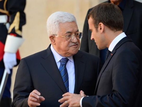 رسالة من عباس لماكرون: نؤيد نزع سلاح حماس